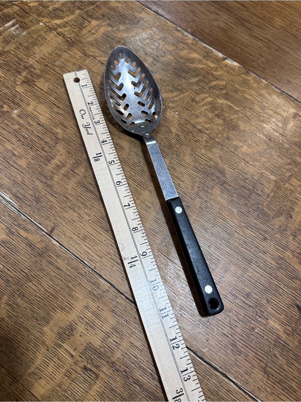 Ekco vintage Stainless Steel Slotted Serving Spoon with Black Handle